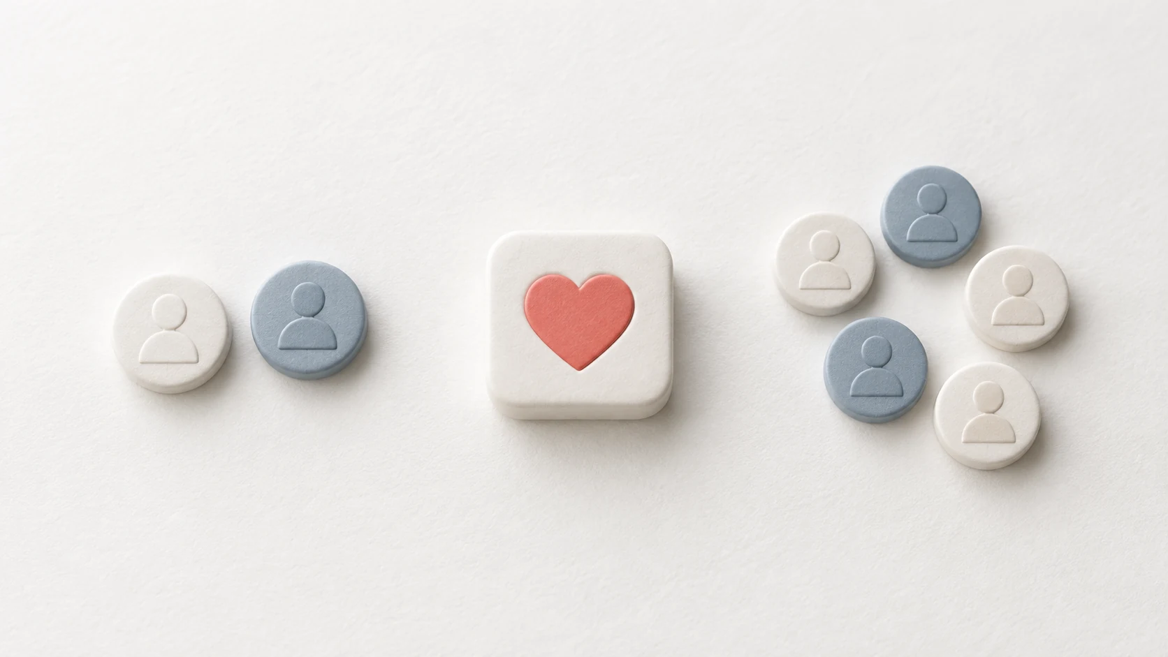 A coral heart button between two familiar people and a larger group of abstract profile discs.